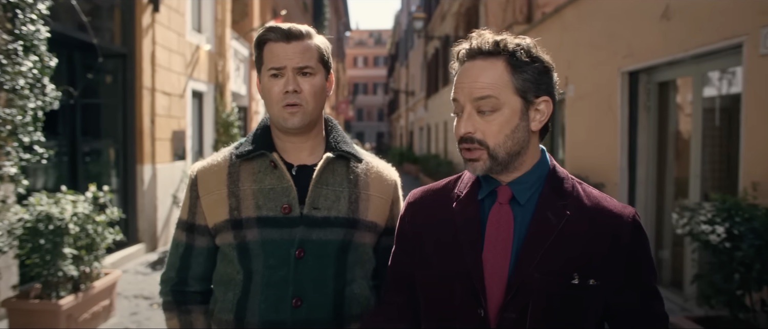 Nick Kroll and Andrew Rannells walking an Italian street in autumn layers, I Don’t Understand You
